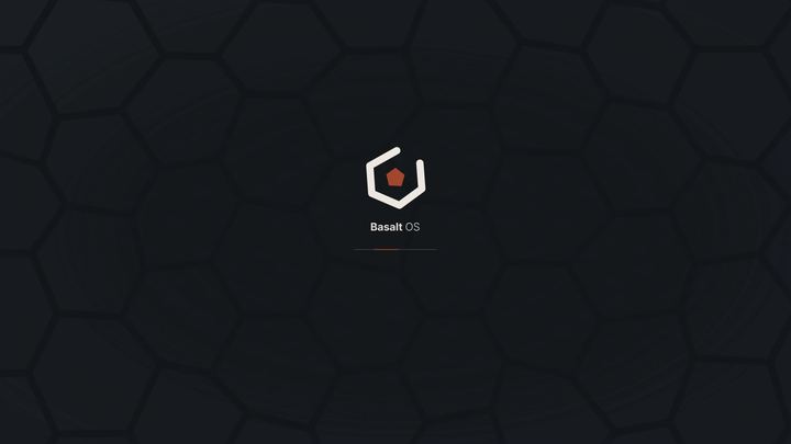 Dark start-up screen with the Basalt OS mark and a thin progress line over a pattern of basalt columns.